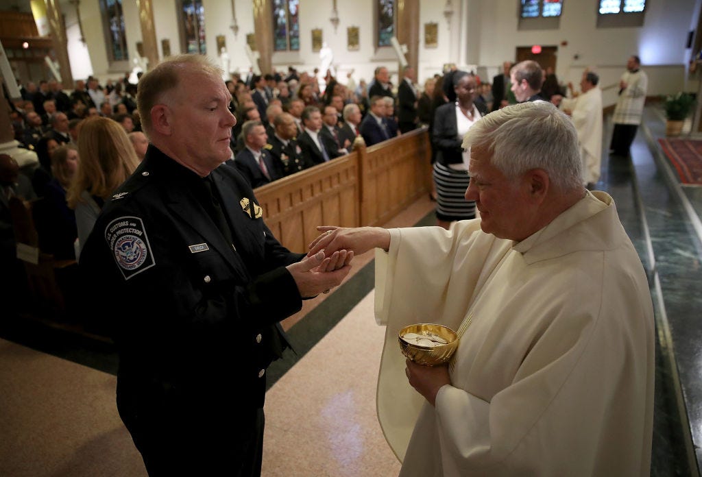 Annual Blue Mass Held At D.C.'s St. Patrick's Catholic Church For First Responders Who Died Over Last Year.  A Florida priest bit a woman during Mass at a Catholic church after she tried to improperly receive Holy Communion.