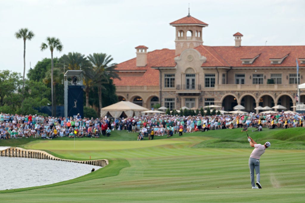 Wyndham Clark of the United States plays a shot on the 18th green during the final round of THE PLAYERS Championship at TPC Sawgrass on March 17, 2024 in Ponte Vedra Beach, Florida.