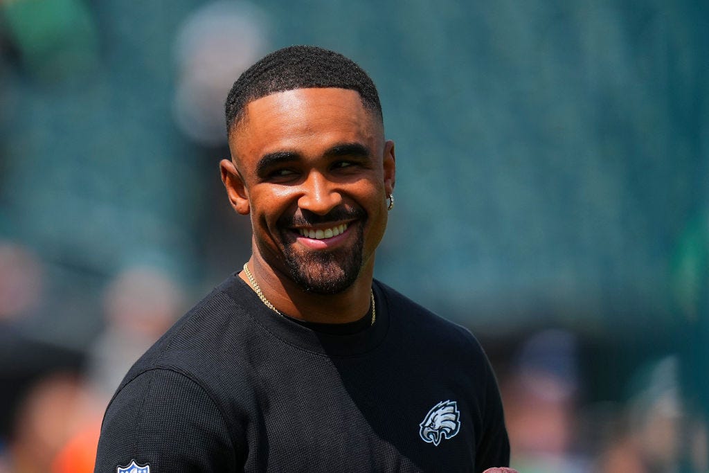 Jalen Hurts #1 of the Philadelphia Eagles smiles prior to the preseason game against the Minnesota Vikings at Lincoln Financial Field on August 24, 2024 in Philadelphia, Pennsylvania before the 2024 NFL Season