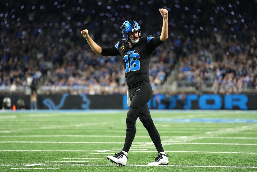 Jared Goff #16 of the Detroit Lions celebrates a touchdown against the Seattle Seahawks during the second quarter at Ford Field on September 30, 2024 in Detroit, Michigan. 